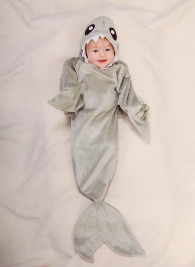 Her first day modeling as a shark
